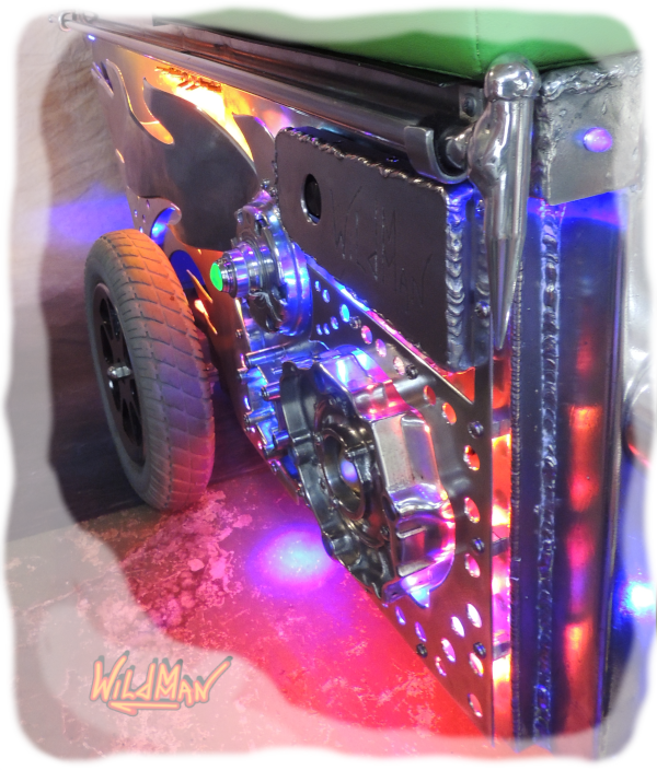 This is a right side closeup image of Wildmman's LED Sled electric mobility kart.